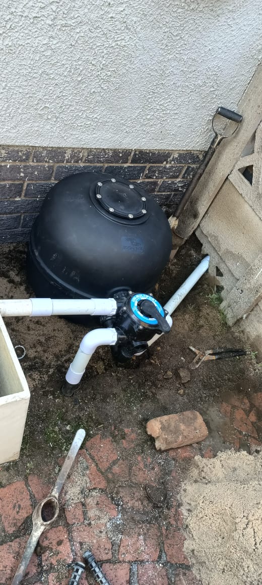 Sand filter and multiport valve installed with new pool plumbing